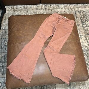 Blush colored flared jeans, size medium